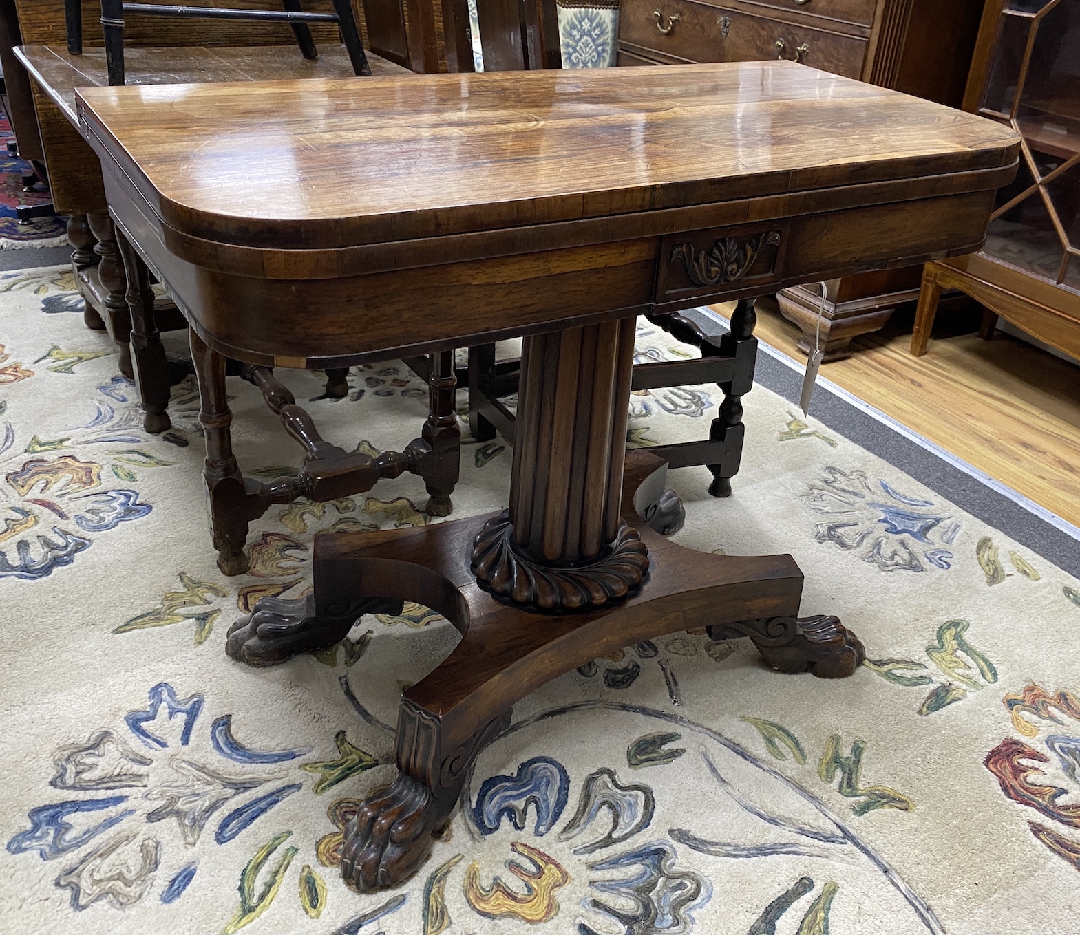 A William IV rosewood folding card table, width 92cm, depth 45cm, height 73cm